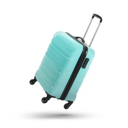 Turquoise suitcase in air on white background