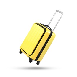 Image of Yellow suitcase in air on white background