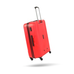 Red suitcase in air on white background