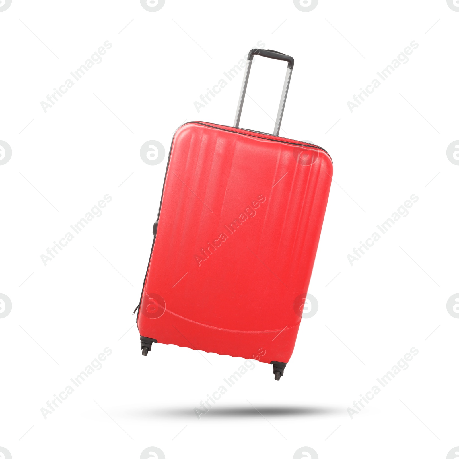 Image of Red suitcase in air on white background