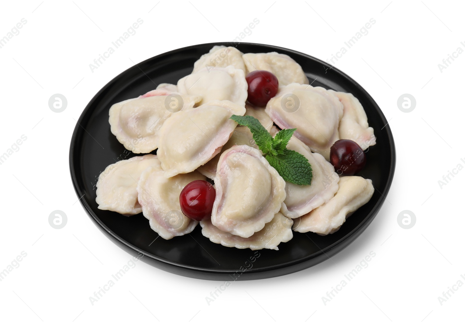 Photo of Traditional Ukrainian dumplings (varenyky) with cherries isolated on white