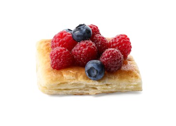 Tasty puff pastry with berries isolated on white