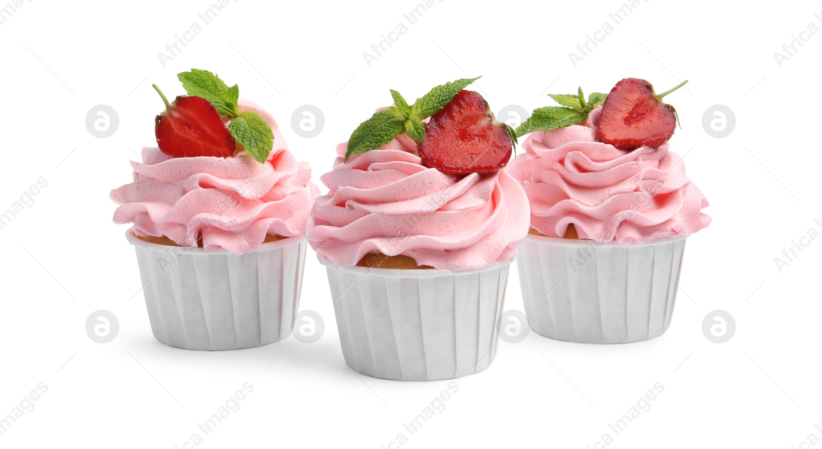 Photo of Tasty cupcakes with strawberries and mint isolated on white