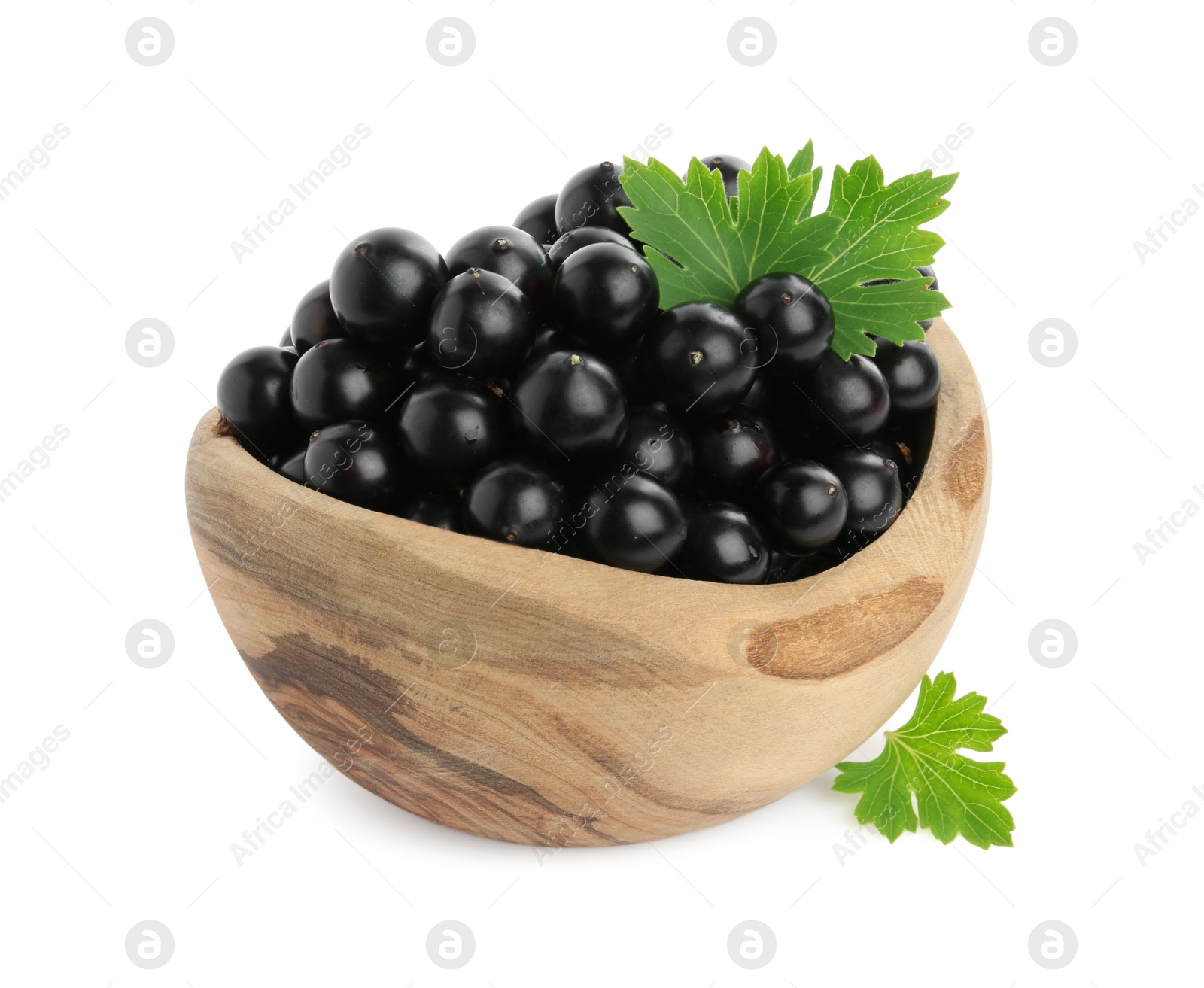 Photo of Fresh ripe black currant berries with leaves isolated on white