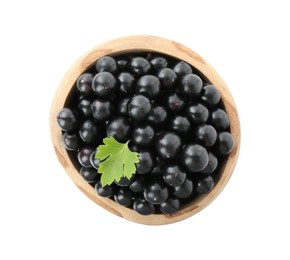 Photo of Fresh ripe black currant berries with leaf isolated on white, top view