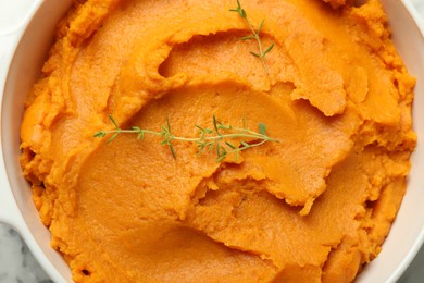 Photo of Delicious mashed sweet potatoes in pot on table, top view