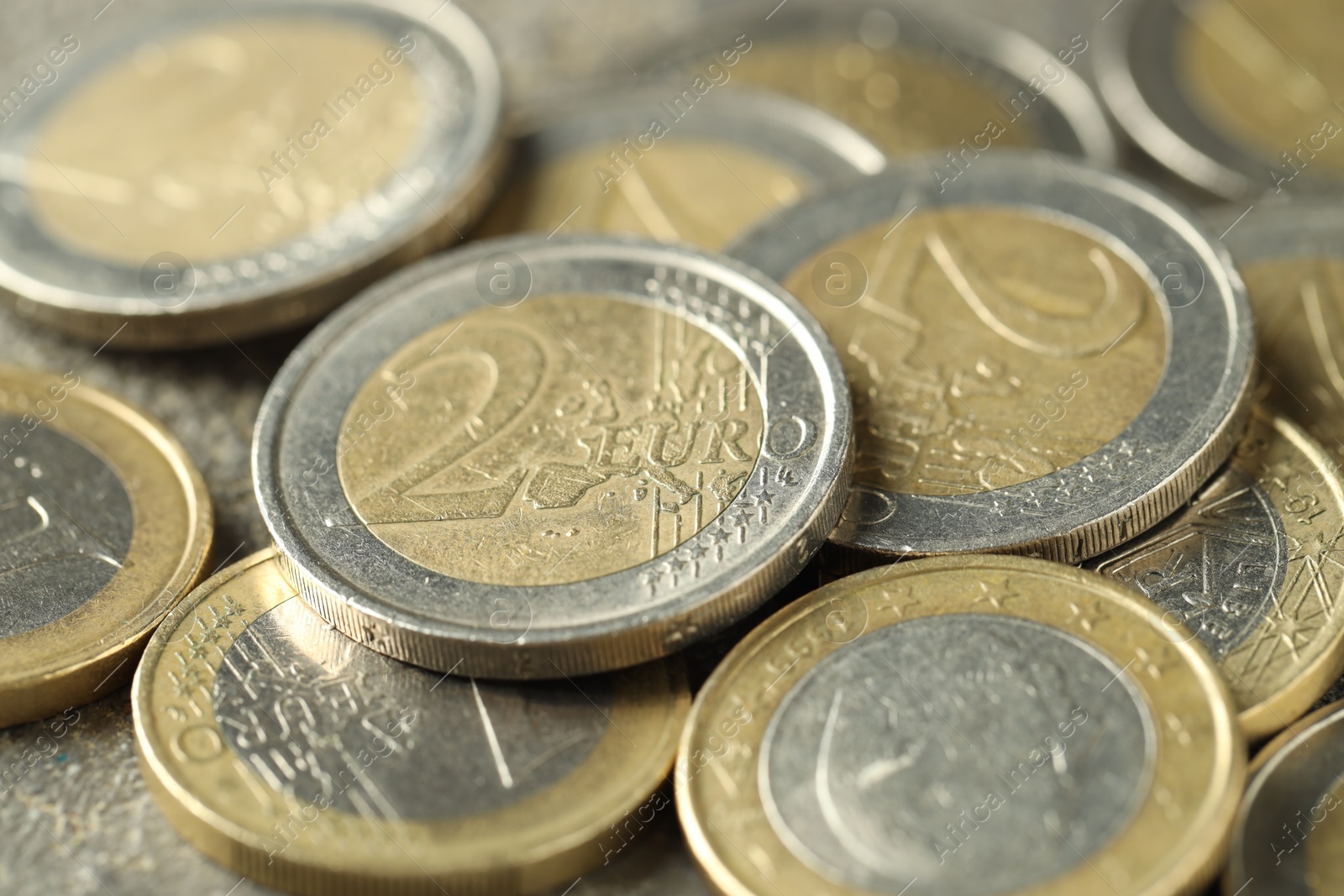 Photo of Many euro coins on table, closeup view