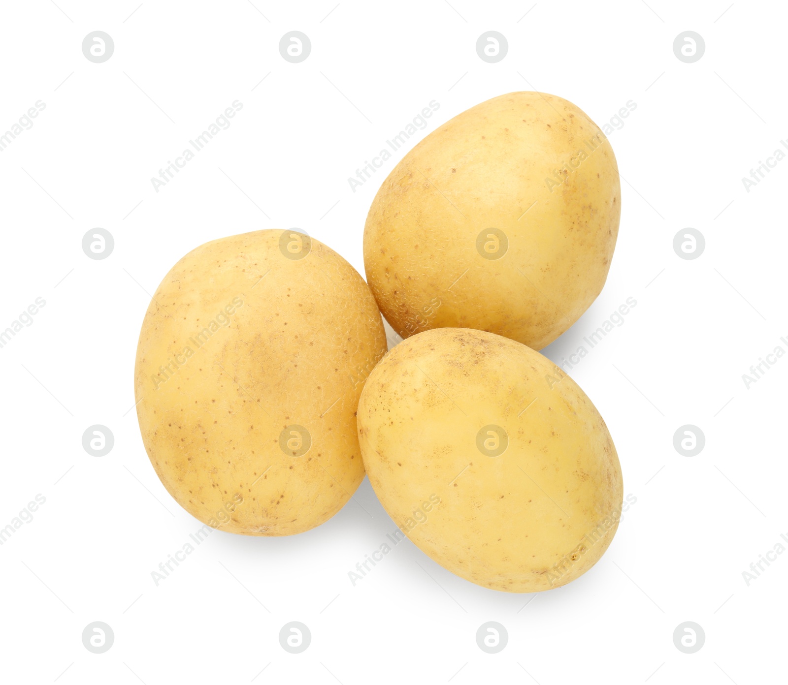 Photo of Three young fresh potatoes isolated on white, top view