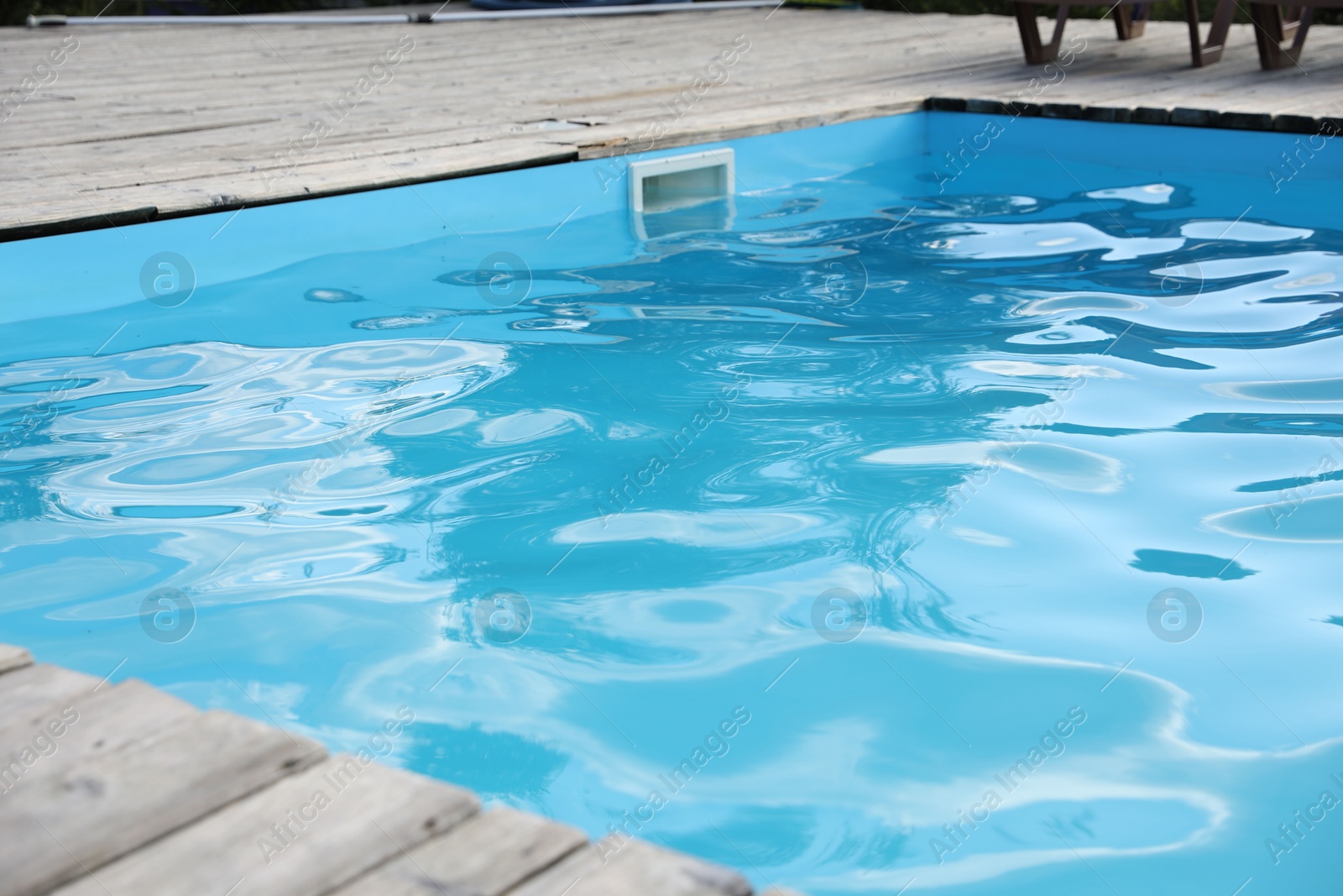 Photo of View of outdoor swimming pool with clear water