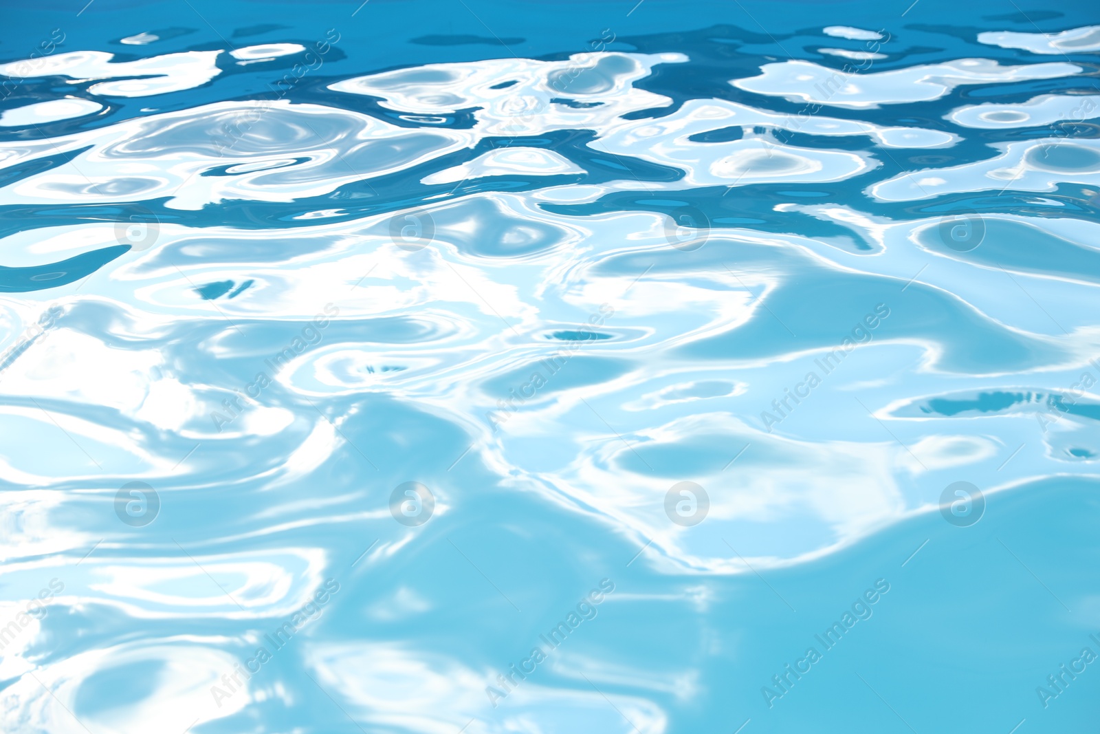 Photo of Swimming pool with clear water as background, closeup