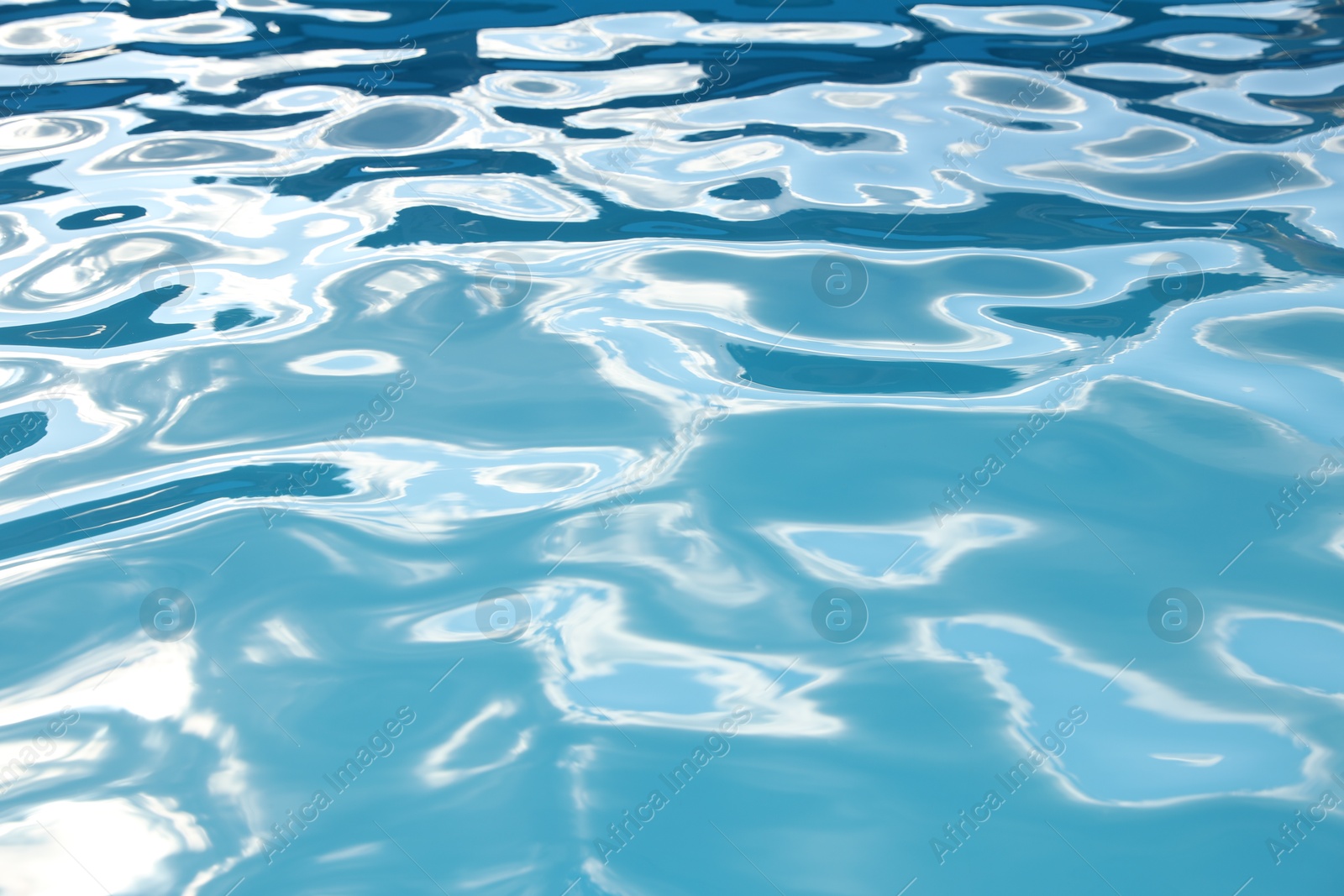 Photo of Swimming pool with clear water as background, closeup