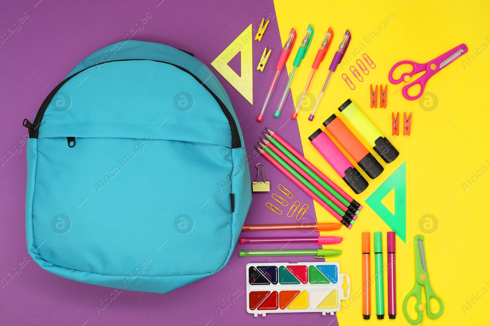 Photo of Flat lay composition with backpack and different school stationery on color background