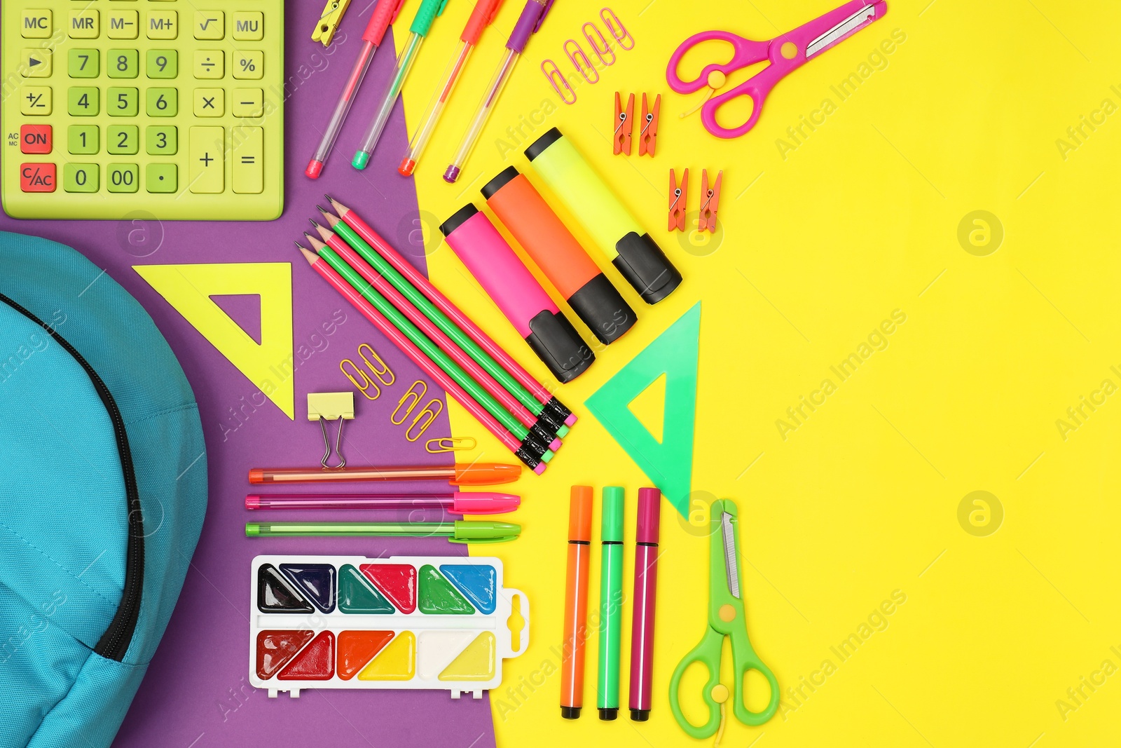 Photo of Flat lay composition with backpack and different school stationery on color background, space for text