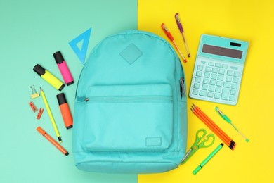 Photo of Flat lay composition with backpack and different school stationery on color background