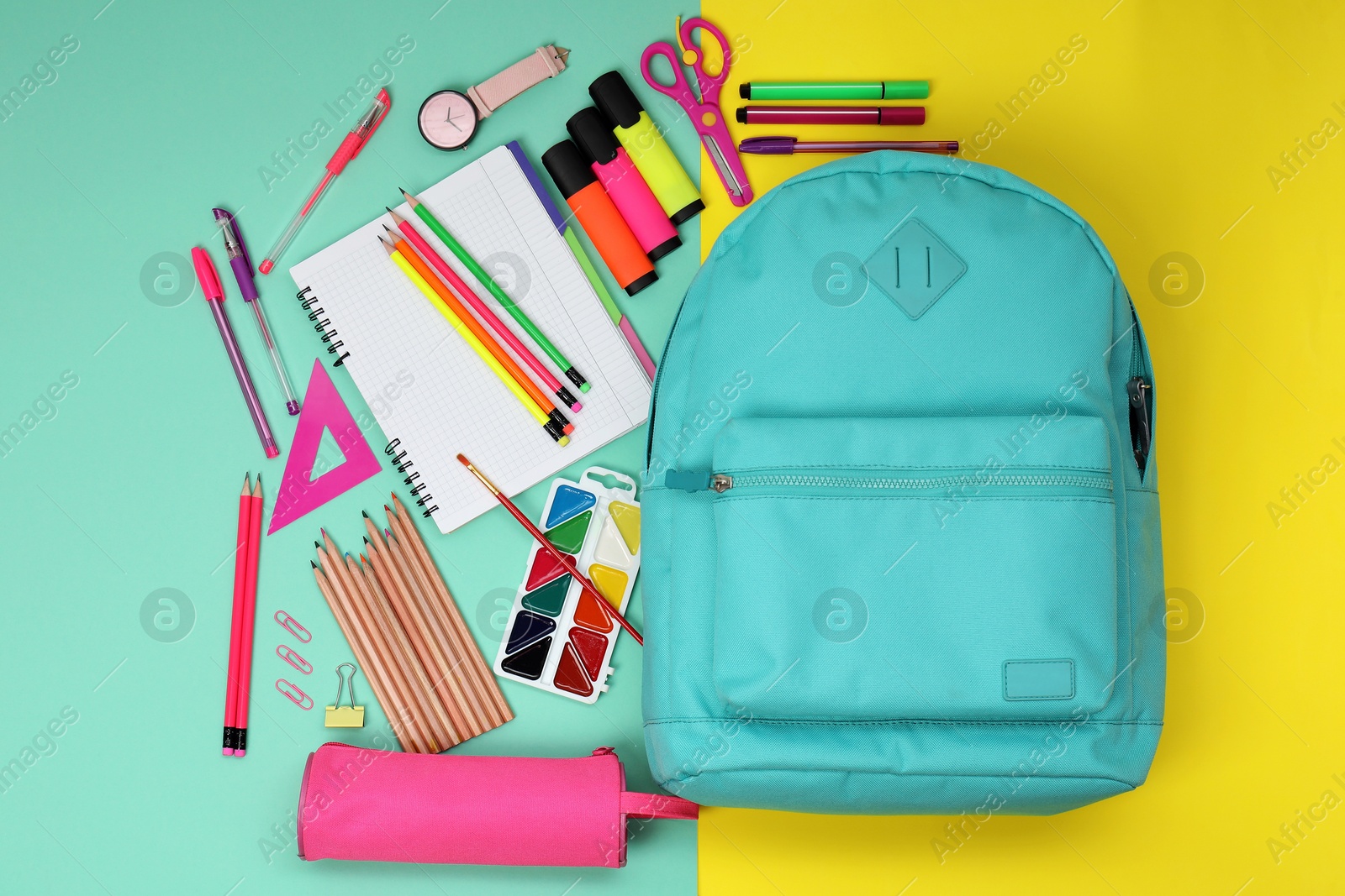 Photo of Flat lay composition with backpack and different school stationery on color background