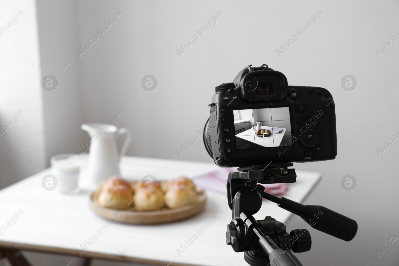 Photo of Shooting food with professional camera in photo studio, selective focus