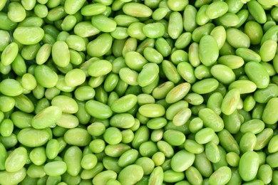 Photo of Raw green edamame soybeans as background, top view