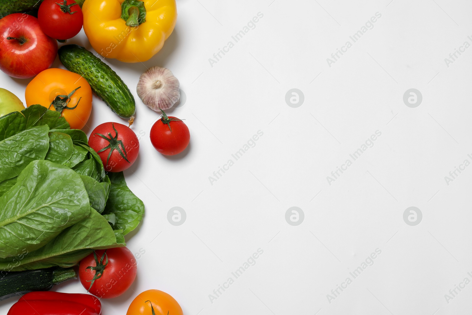 Photo of Healthy vegetarian food. Different vegetables on white background, flat lay. Space for text