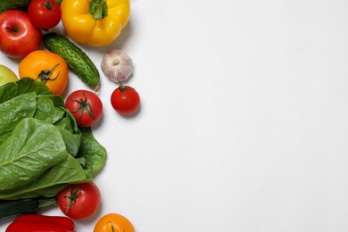 Photo of Healthy vegetarian food. Different vegetables on white background, flat lay. Space for text