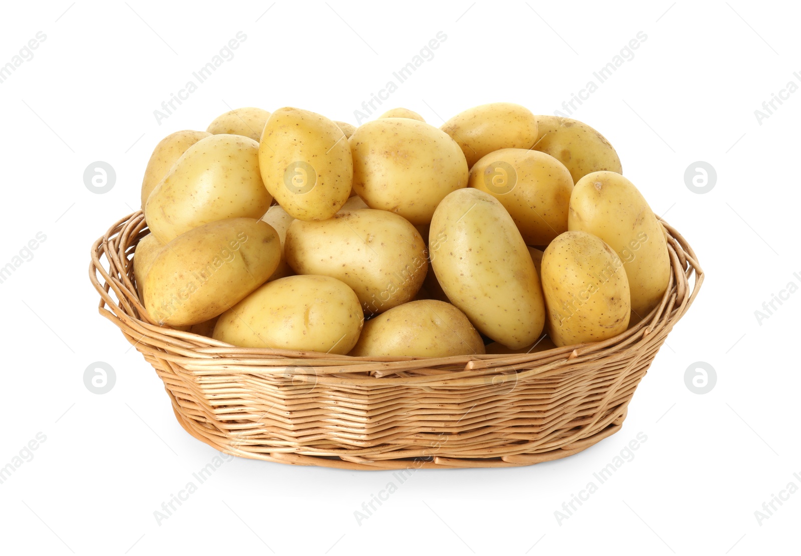 Photo of Young potatoes in wicker basket isolated on white