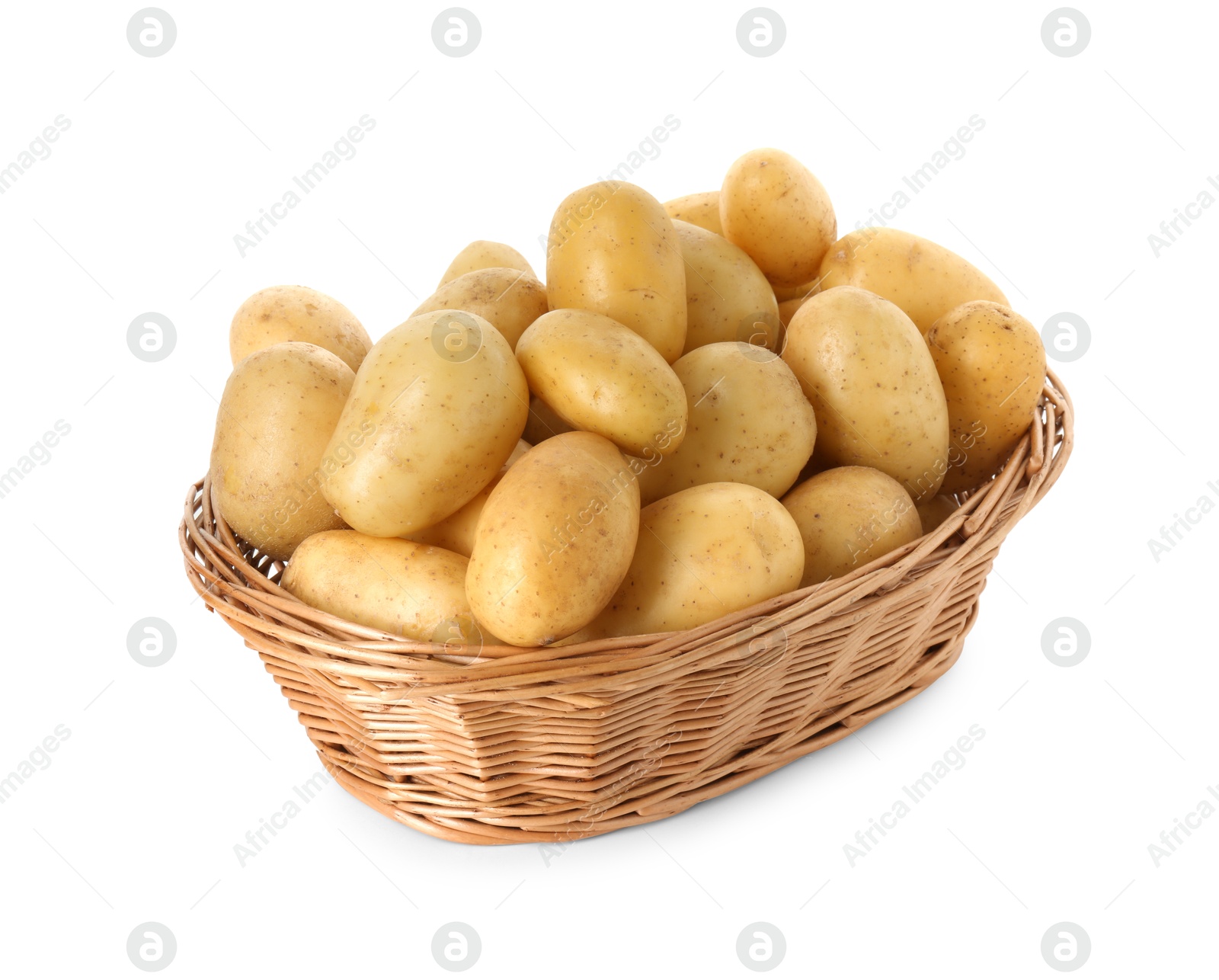 Photo of Young potatoes in wicker basket isolated on white