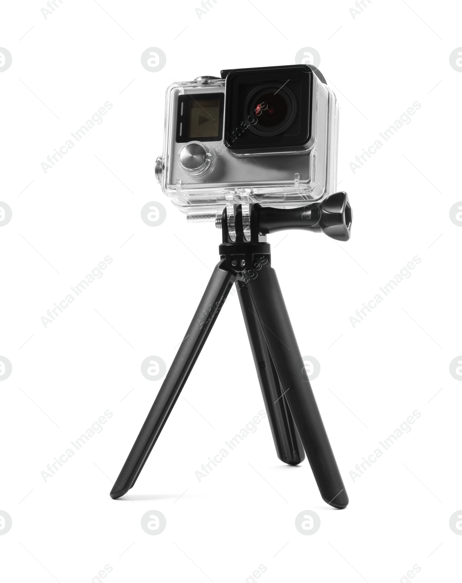 Photo of Modern action camera and tripod isolated on white