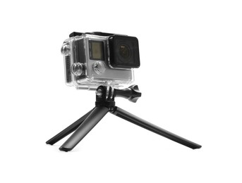 Modern action camera and tripod isolated on white