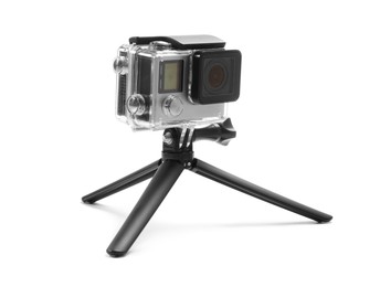 Modern action camera and tripod isolated on white