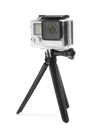 Modern action camera and tripod isolated on white