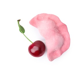 One frozen dumpling (varenyk) and fresh cherry isolated on white, top view