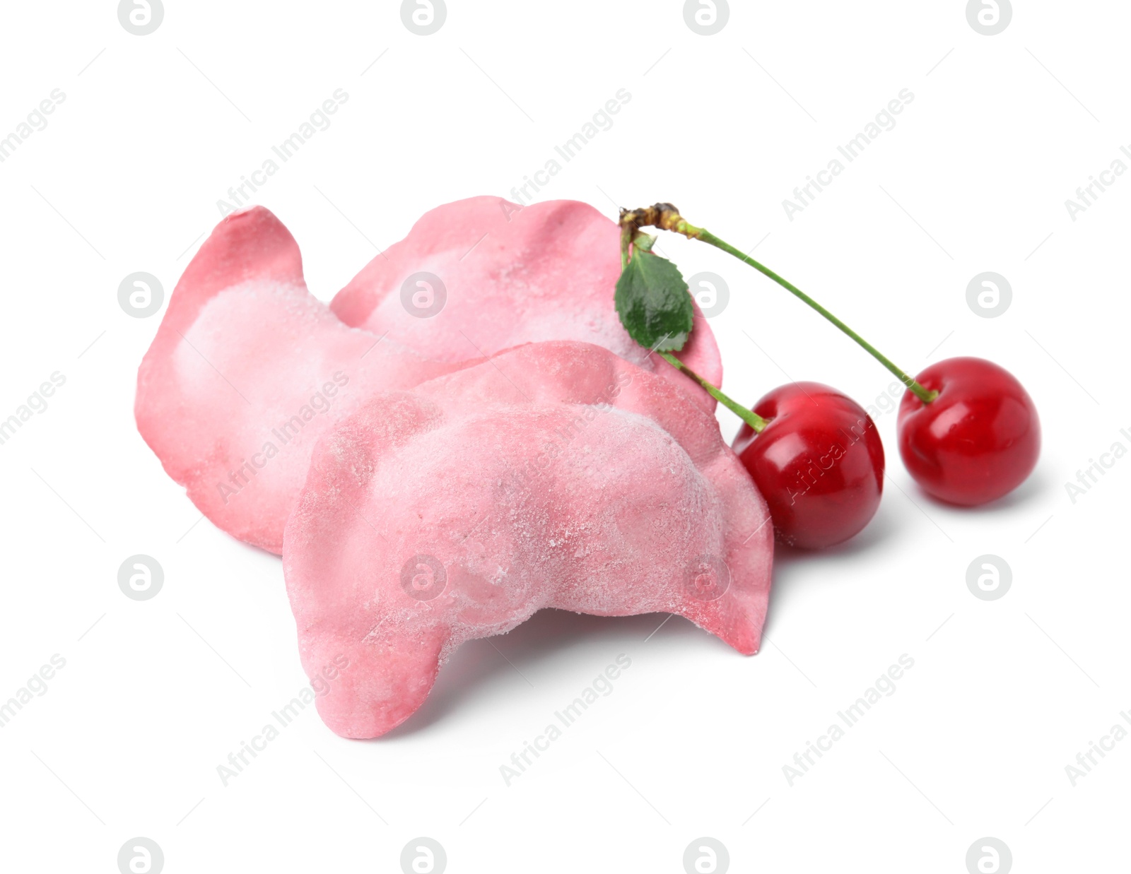 Photo of Frozen dumplings (varenyky) and fresh cherries isolated on white. Ukrainian cuisine