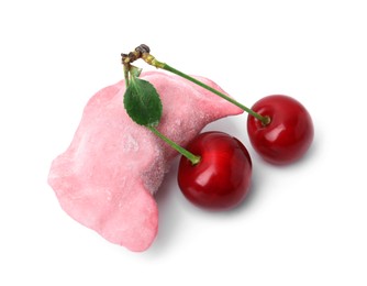 Frozen dumpling (varenyk) and fresh cherries isolated on white. Ukrainian cuisine