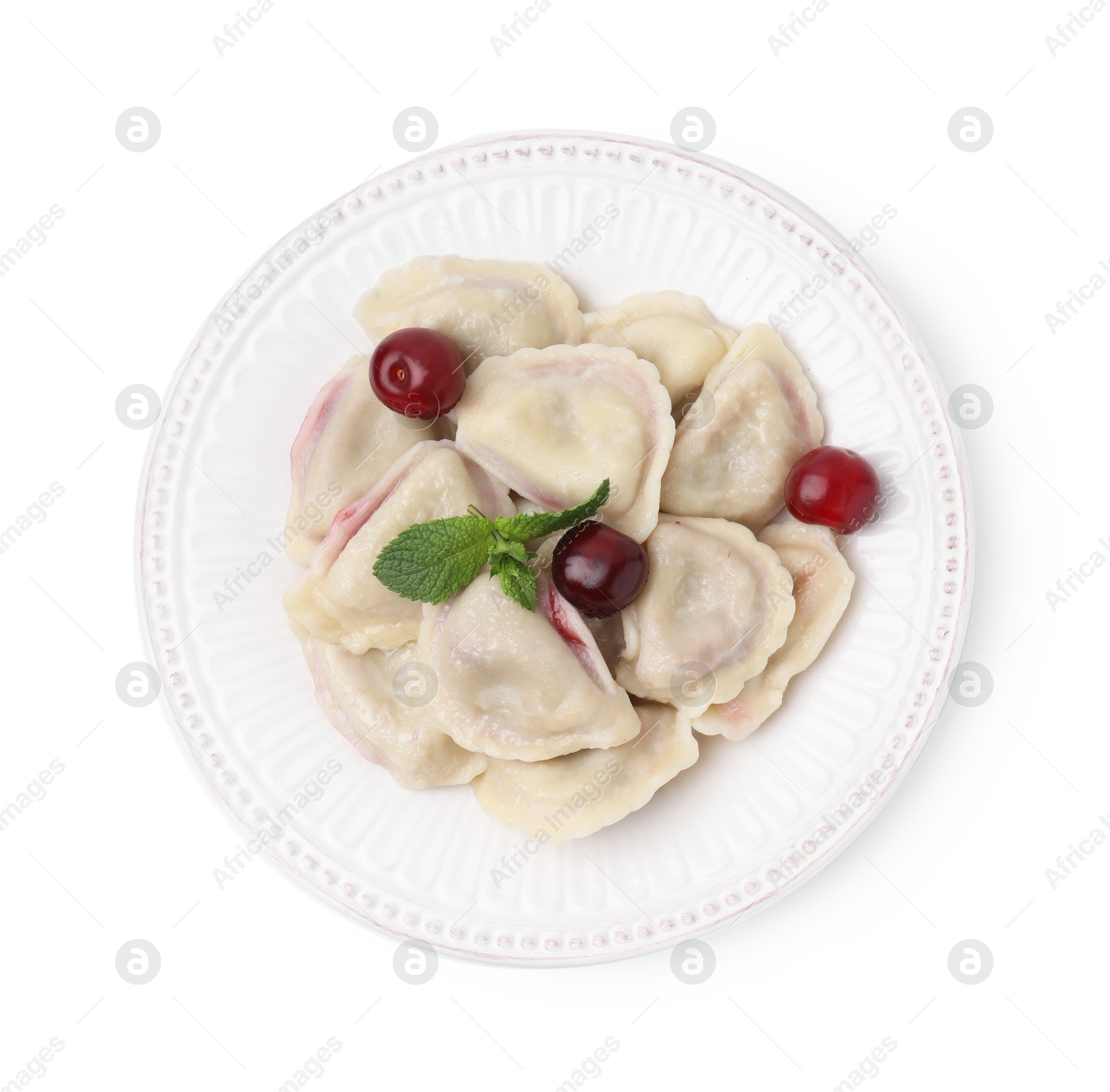 Photo of Traditional Ukrainian dumplings (varenyky) with cherries isolated on white, top view