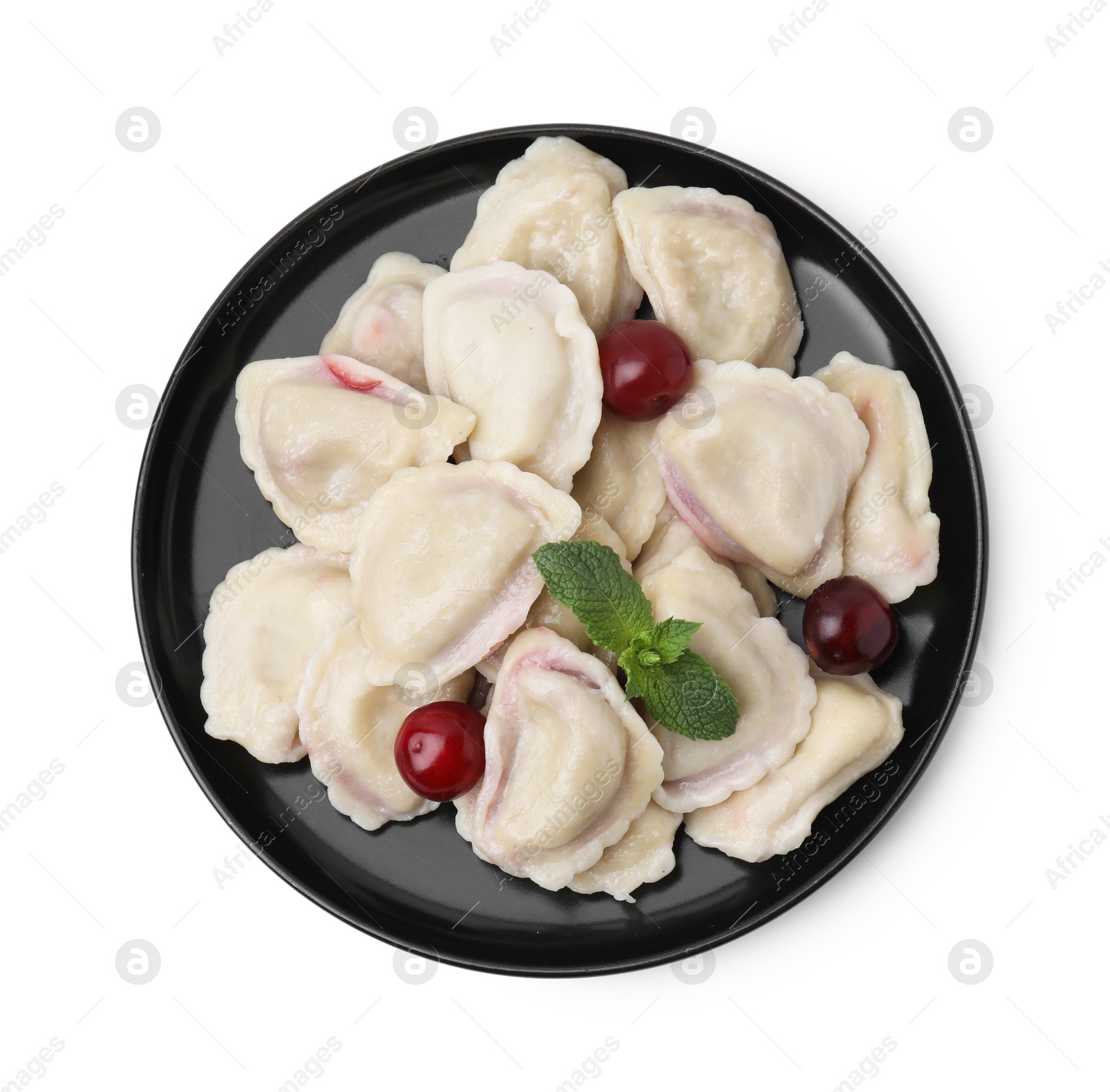 Photo of Traditional Ukrainian dumplings (varenyky) with cherries isolated on white, top view