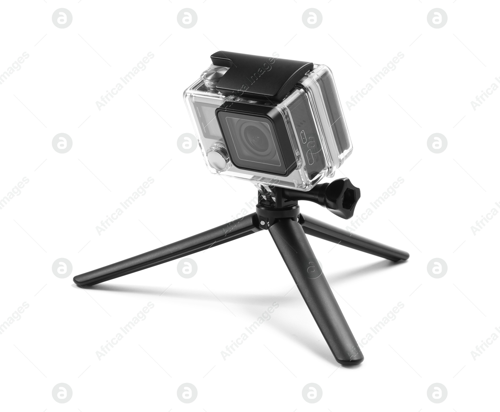 Photo of Modern action camera and tripod isolated on white