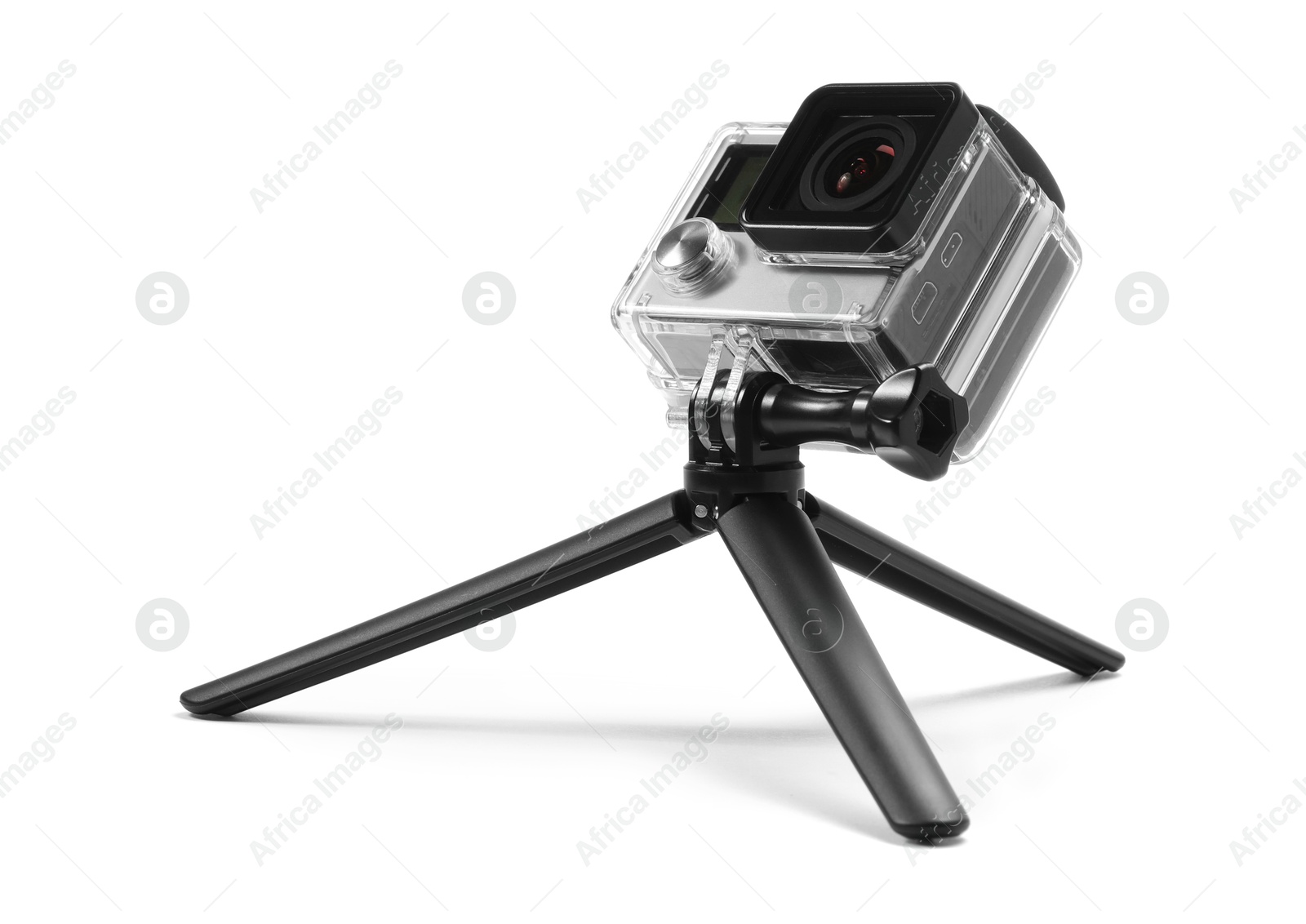 Photo of Modern action camera and tripod isolated on white