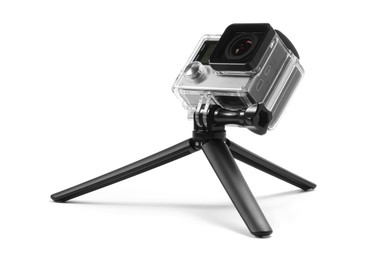 Modern action camera and tripod isolated on white