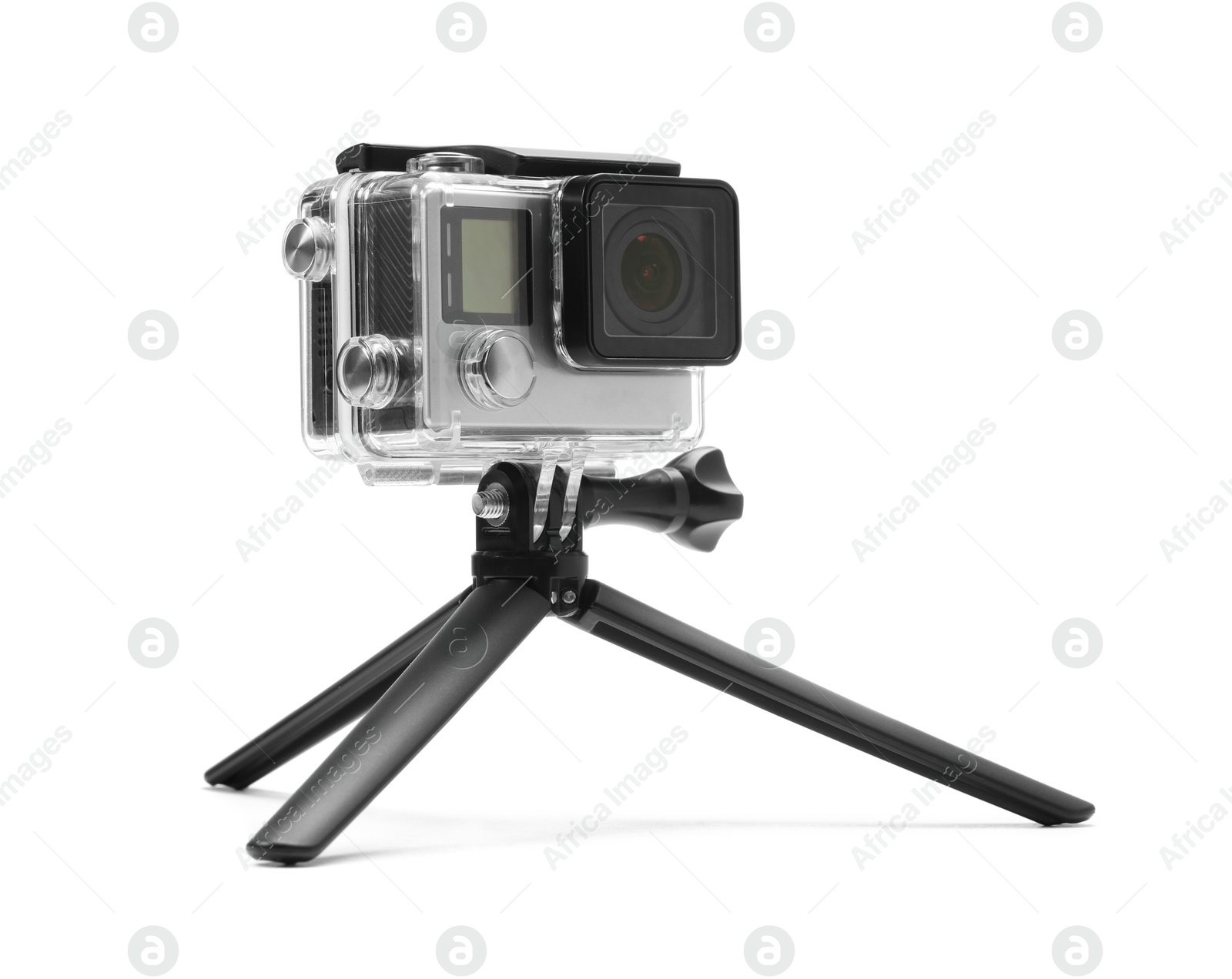 Photo of Modern action camera and tripod isolated on white