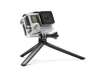 Modern action camera and tripod isolated on white