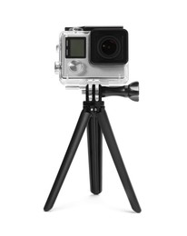 Photo of Modern action camera and tripod isolated on white