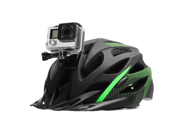 Photo of Modern action camera on helmet against white background