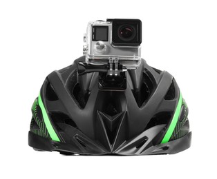 Modern action camera on helmet against white background