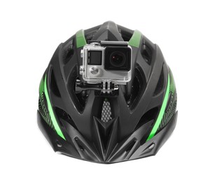 Modern action camera on helmet against white background