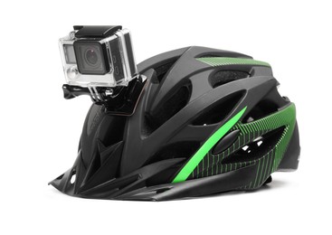 Photo of Modern action camera on helmet against white background