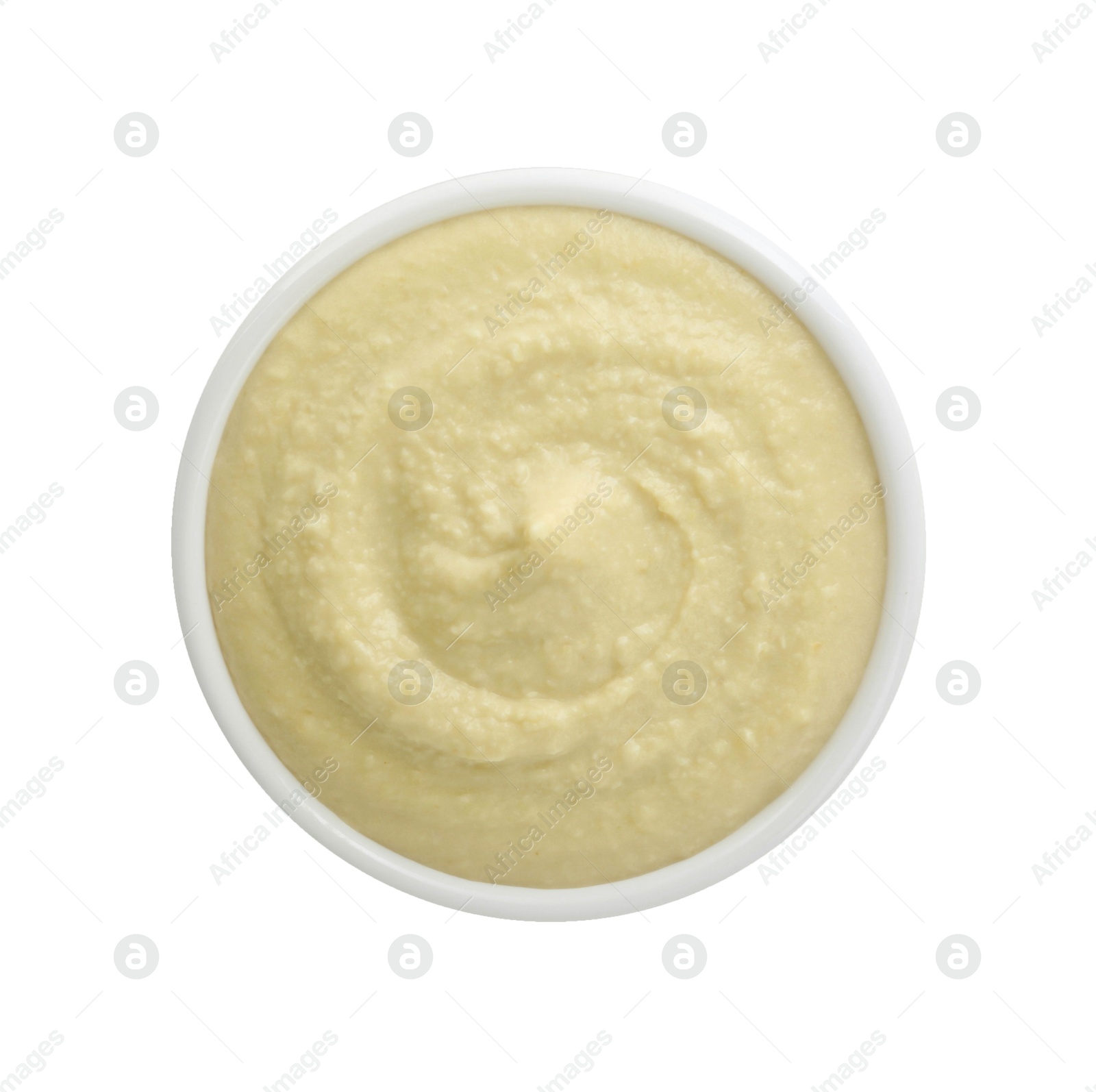 Photo of Delicious hummus in bowl isolated on white, top view