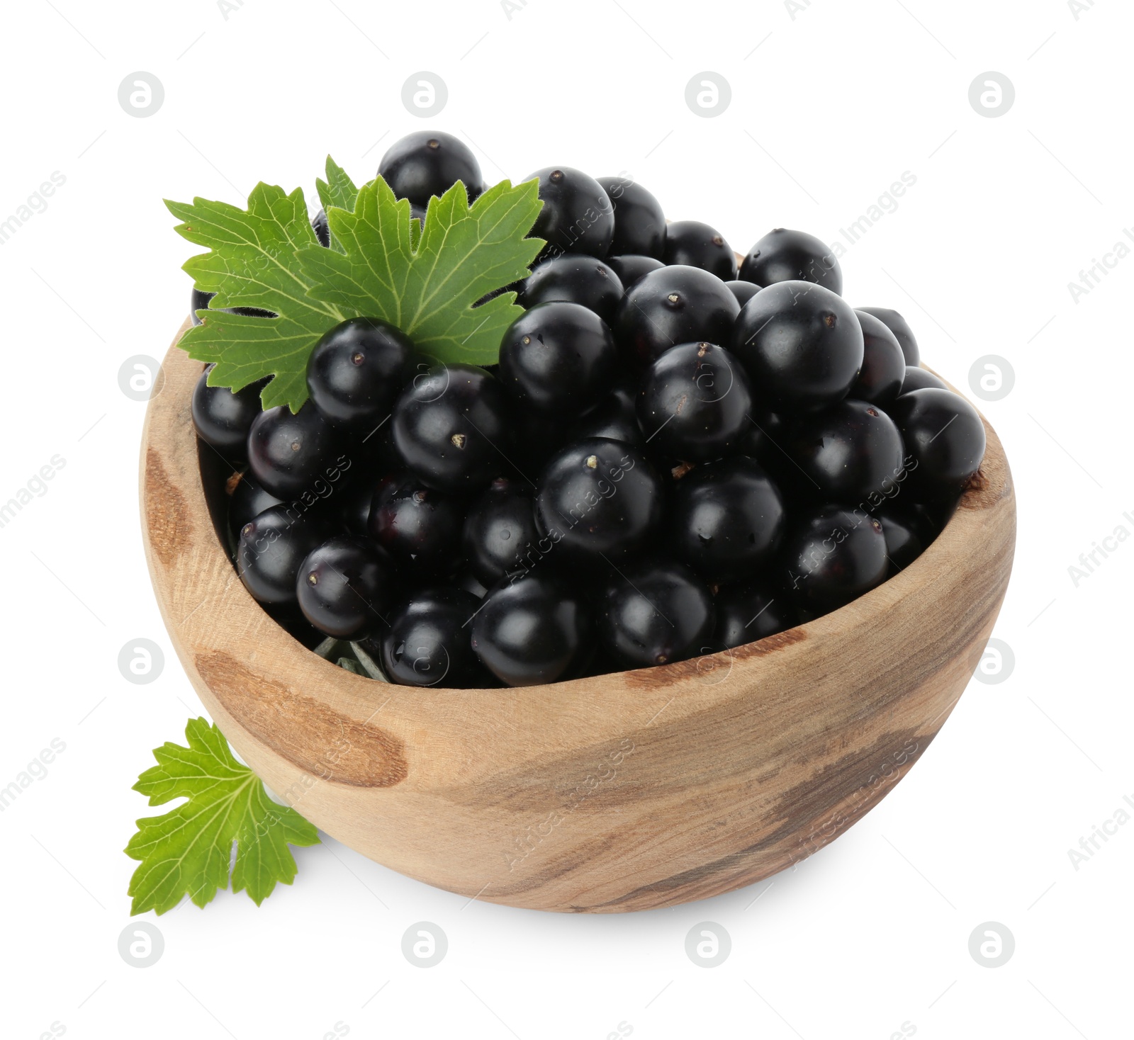 Photo of Fresh ripe black currant berries with leaves isolated on white