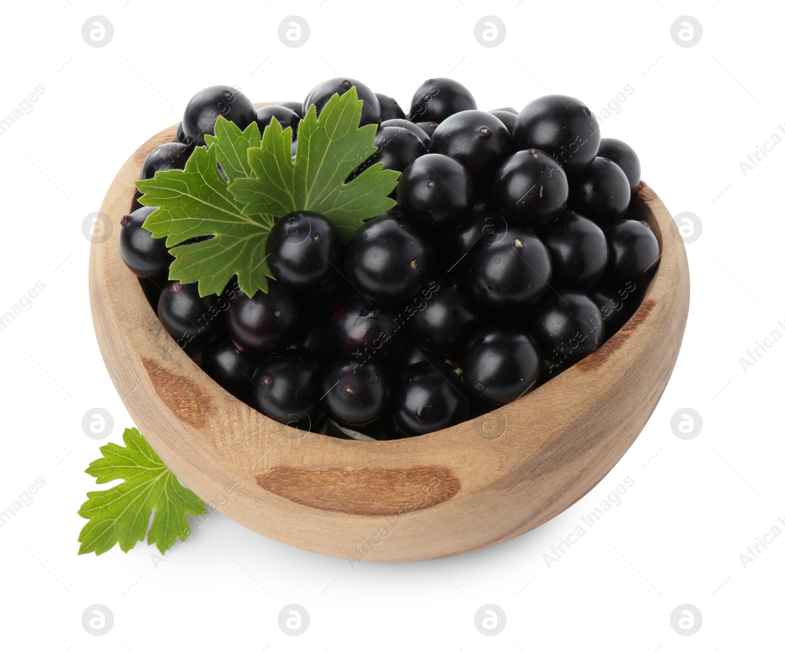 Photo of Fresh ripe black currant berries with leaves isolated on white