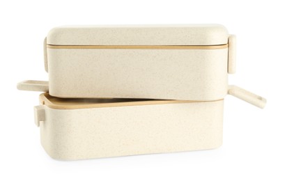 Beige plastic lunch boxes isolated on white