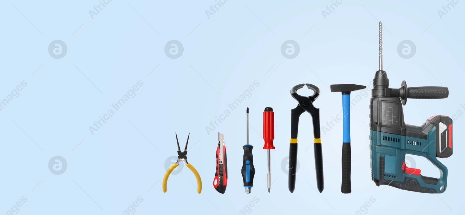 Image of Set of different construction tools on light blue background, space for text. Banner design