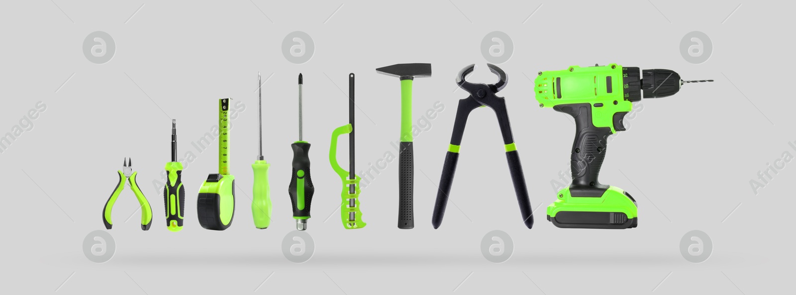 Image of Set of different construction tools on light grey background. Banner design